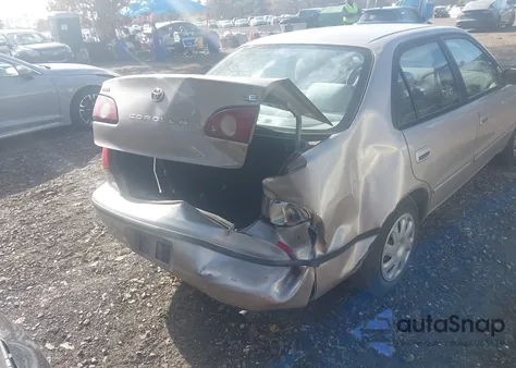 2001 Toyota Corolla Le from USA, damaged, VIN 2T1BR12E01C504200